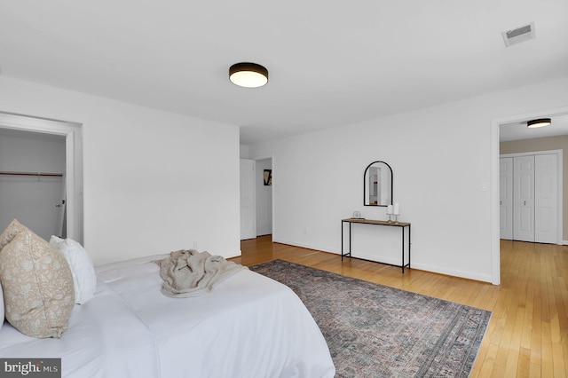 2725 Woodridge Ct, West Friendship, MD 21794 - bedroom featuring hardwood / wood-style flooring and baseboards
