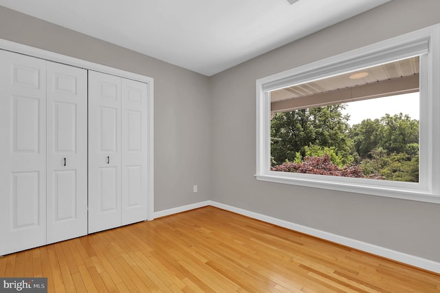 2725 Woodridge Ct, West Friendship, MD 21794 - unfurnished bedroom featuring a closet and light wood-style floors