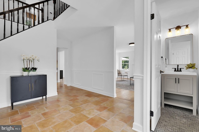 2725 Woodridge Ct, West Friendship, MD 21794 - hall with a towering ceiling and stairway