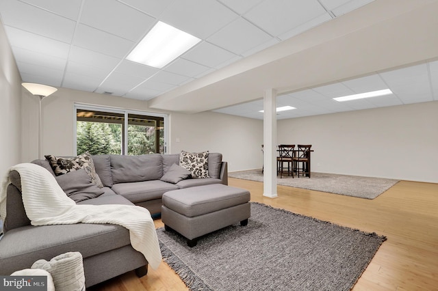 2725 Woodridge Ct, West Friendship, MD 21794 - living room featuring a paneled ceiling and wood finished floors