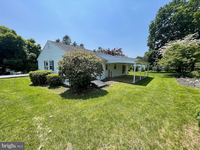 120 Locust Knoll Rd, Downingtown, PA 19335 - back of house with a lawn and a patio area