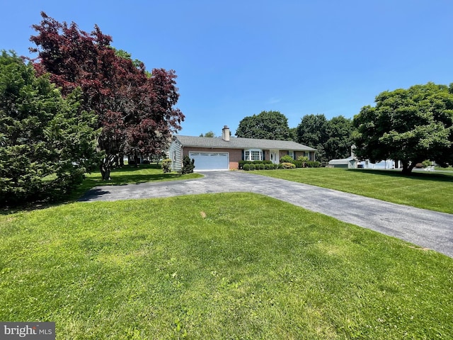 120 Locust Knoll Rd, Downingtown, PA 19335 - single story home with driveway, a front lawn, a chimney, and an attached garage