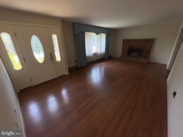 120 Locust Knoll Rd, Downingtown, PA 19335 - foyer entrance featuring wood finished floors and a fireplace
