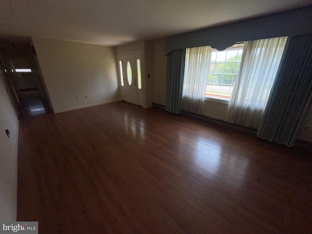 120 Locust Knoll Rd, Downingtown, PA 19335 - unfurnished living room with wood finished floors and baseboards