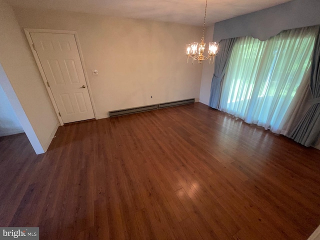 120 Locust Knoll Rd, Downingtown, PA 19335 - unfurnished room featuring a chandelier, baseboard heating, and wood finished floors