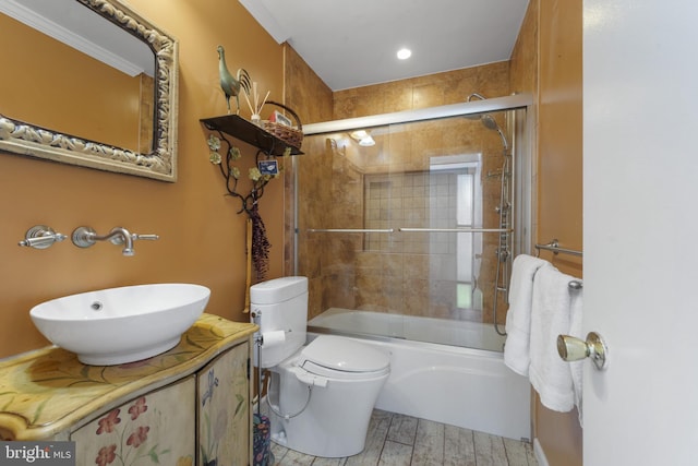 23 Penny Ln Unit 23, Baltimore, MD 21209 - full bathroom with vanity, bath / shower combo with glass door, and wood finished floors