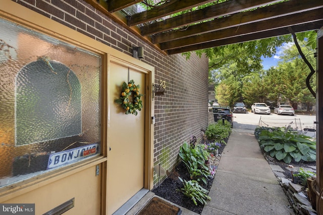 23 Penny Ln Unit 23, Baltimore, MD 21209 - view of exterior entry featuring brick siding