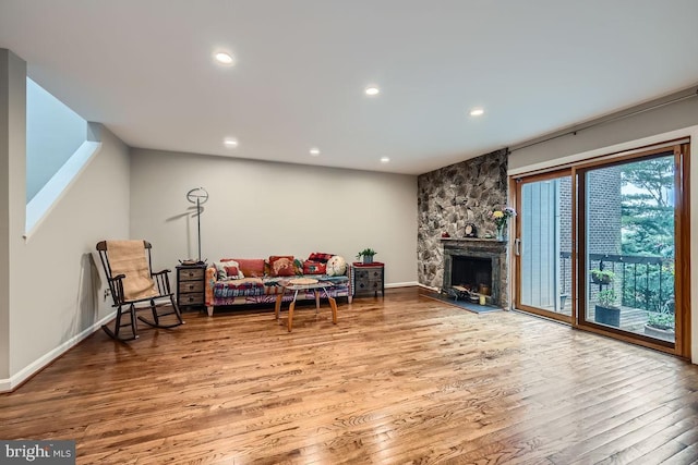 23 Penny Ln Unit 23, Baltimore, MD 21209 - sitting room featuring wood finished floors, recessed lighting, and a fireplace
