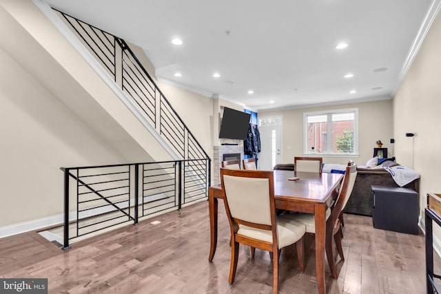 1128 S 24th St S, Philadelphia, PA 19146 - dining space with crown molding, wood finished floors, recessed lighting, and stairs