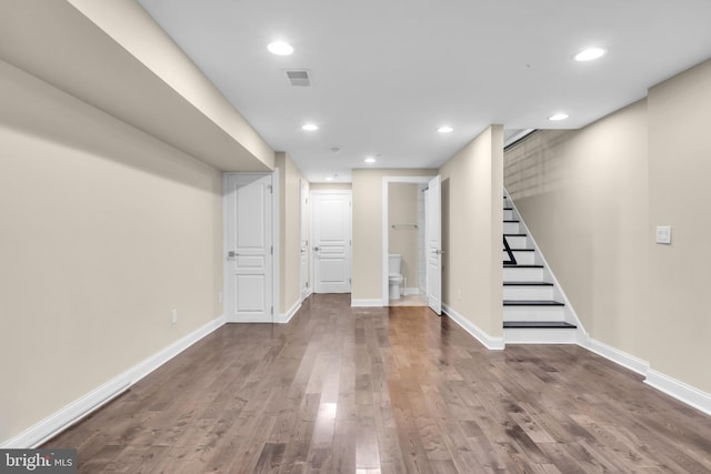 1128 S 24th St S, Philadelphia, PA 19146 - basement featuring wood finished floors, stairs, and recessed lighting