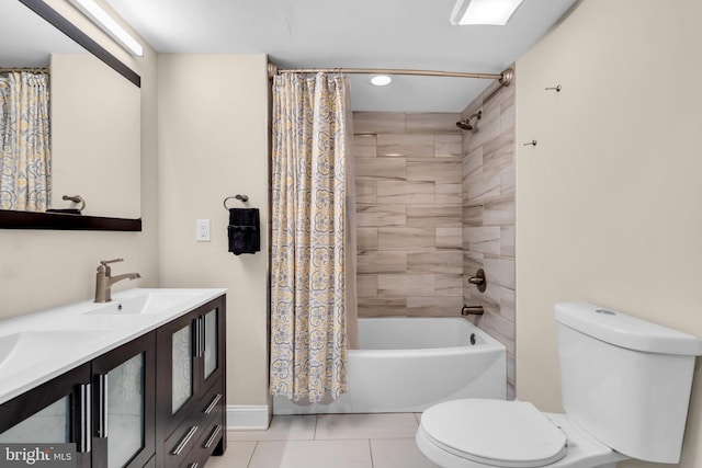 1128 S 24th St S, Philadelphia, PA 19146 - bathroom with shower / tub combo, double vanity, tile patterned flooring, and recessed lighting