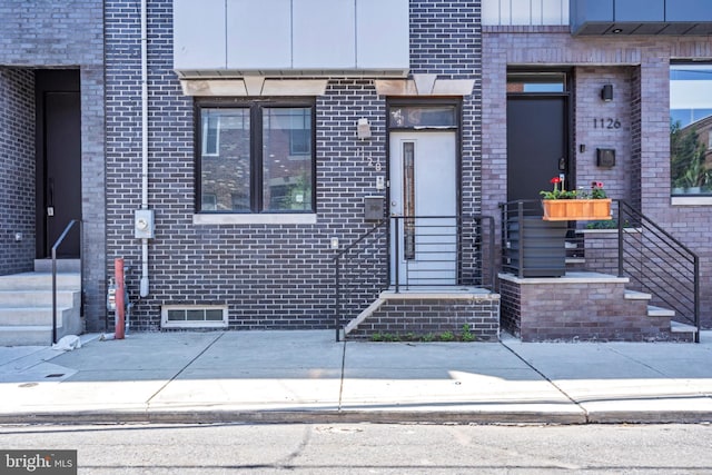 1128 S 24th St S, Philadelphia, PA 19146 - property entrance featuring brick siding