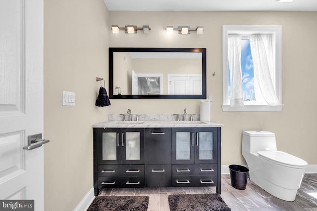 1128 S 24th St S, Philadelphia, PA 19146 - bathroom with double vanity and wood finished floors