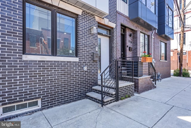 1128 S 24th St S, Philadelphia, PA 19146 - doorway to property featuring brick siding