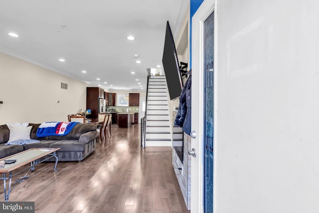 1128 S 24th St S, Philadelphia, PA 19146 - living area featuring ornamental molding, stairway, recessed lighting, and dark wood-type flooring