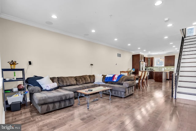 1128 S 24th St S, Philadelphia, PA 19146 - living area featuring ornamental molding, stairway, recessed lighting, and wood finished floors