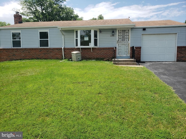 12901 Applecross Dr, Clinton, MD 20735 - ranch-style home featuring brick siding, a chimney, an attached garage, a front lawn, and asphalt driveway