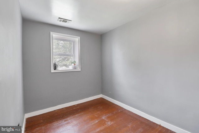 104 Ferndale Rd, Glen Burnie, MD 21061 - spare room featuring dark wood finished floors and baseboards
