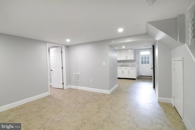 104 Ferndale Rd, Glen Burnie, MD 21061 - unfurnished living room featuring a sink and recessed lighting