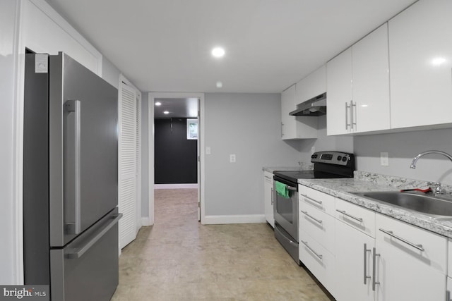 104 Ferndale Rd, Glen Burnie, MD 21061 - kitchen with appliances with stainless steel finishes, under cabinet range hood, white cabinetry, and recessed lighting