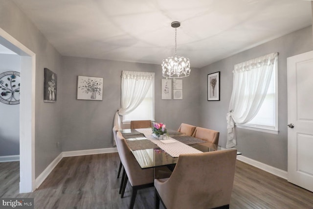 104 Ferndale Rd, Glen Burnie, MD 21061 - dining room featuring a chandelier, healthy amount of natural light, and wood finished floors