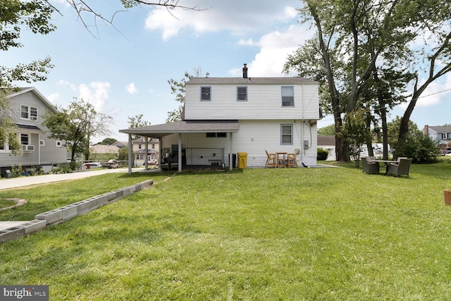 104 Ferndale Rd, Glen Burnie, MD 21061 - rear view of house featuring a yard