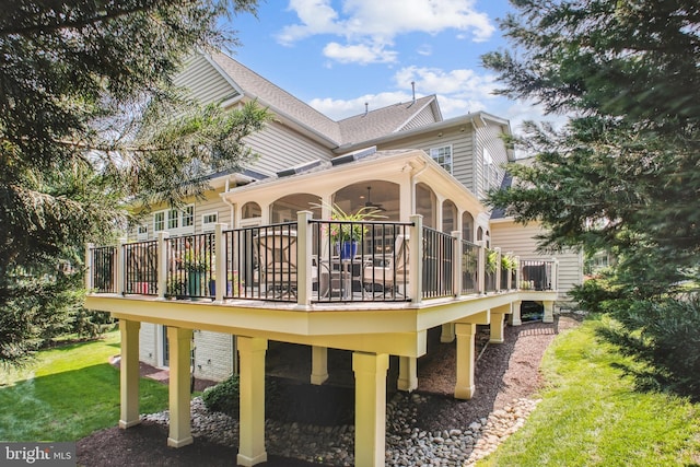 18510 Barton Creek Pl, Leesburg, VA 20176 - back of property featuring a wooden deck, a ceiling fan, and a lawn