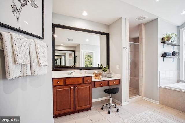 18510 Barton Creek Pl, Leesburg, VA 20176 - bathroom with tile patterned floors, a shower stall, a garden tub, vanity, and recessed lighting