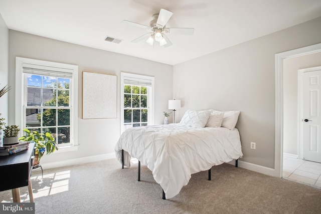 18510 Barton Creek Pl, Leesburg, VA 20176 - carpeted bedroom featuring baseboards and ceiling fan