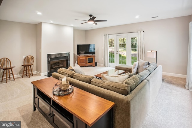 18510 Barton Creek Pl, Leesburg, VA 20176 - living area featuring light colored carpet, ceiling fan, recessed lighting, and a fireplace