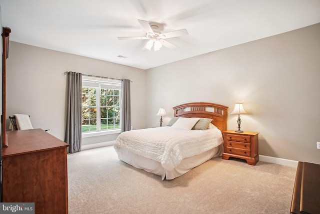 18510 Barton Creek Pl, Leesburg, VA 20176 - carpeted bedroom featuring baseboards and a ceiling fan