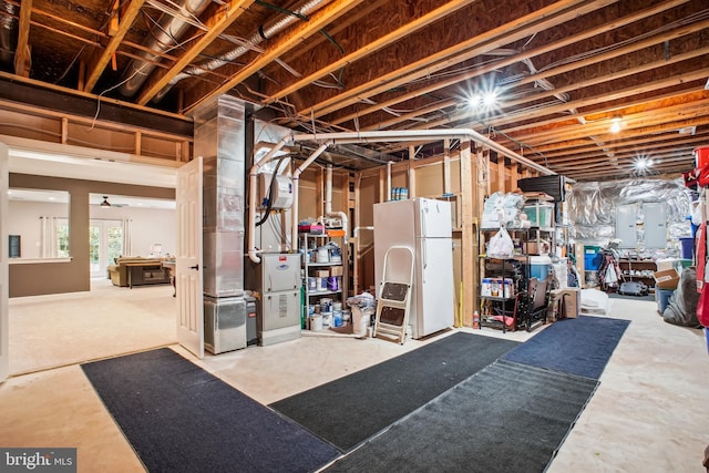 18510 Barton Creek Pl, Leesburg, VA 20176 - below grade area with freestanding refrigerator and heating unit