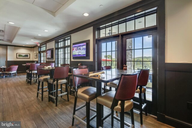 18510 Barton Creek Pl, Leesburg, VA 20176 - dining space featuring healthy amount of natural light, wood finished floors, crown molding, and recessed lighting