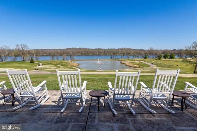 18510 Barton Creek Pl, Leesburg, VA 20176 - view of patio / terrace with a water view, a fire pit, and golf course view