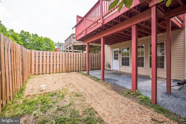 5514 Aeriel Pl, Frederick, MD 21703 - fenced backyard featuring a wooden deck and a patio