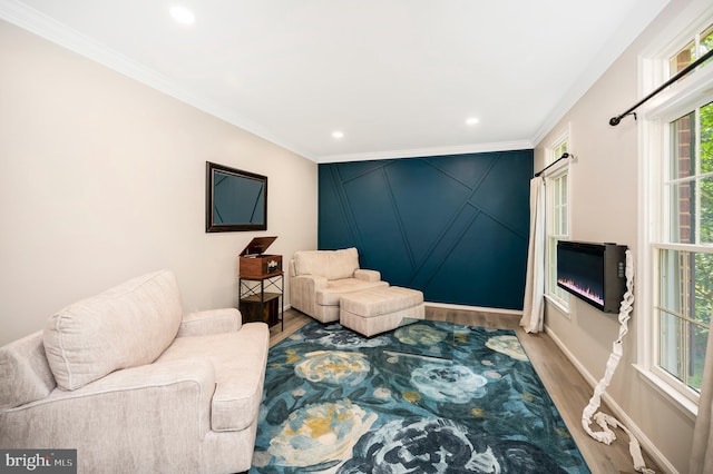 12424 Silent Wolf Dr, Manassas, VA 20112 - living room featuring wood finished floors, ornamental molding, and recessed lighting