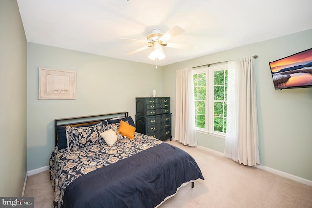 12424 Silent Wolf Dr, Manassas, VA 20112 - carpeted bedroom with baseboards and ceiling fan