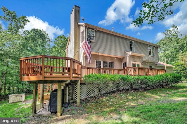 12424 Silent Wolf Dr, Manassas, VA 20112 - rear view of property featuring a chimney and a deck
