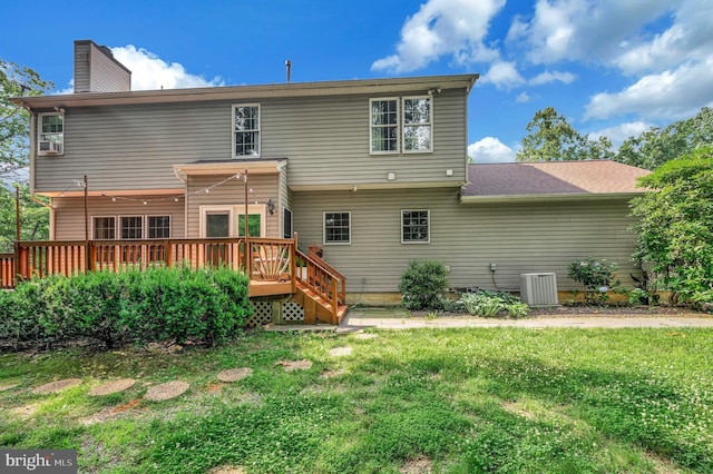 12424 Silent Wolf Dr, Manassas, VA 20112 - back of property featuring a lawn, a wooden deck, and a chimney