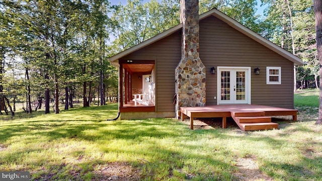 542 Hidden Acres Rd, Mount Storm, WV 26739 - rear view of house featuring a lawn, french doors, a chimney, and a deck