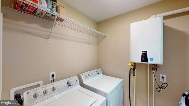 542 Hidden Acres Rd, Mount Storm, WV 26739 - laundry room with tankless water heater and separate washer and dryer