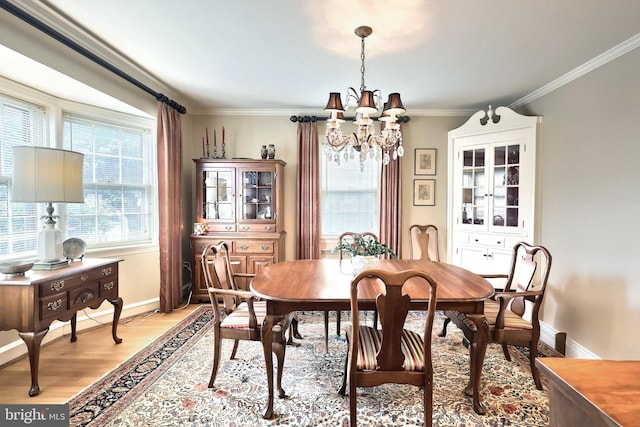 3172 N George St, Emigsville, PA 17318 - dining room featuring a chandelier, light wood-style flooring, baseboards, and ornamental molding