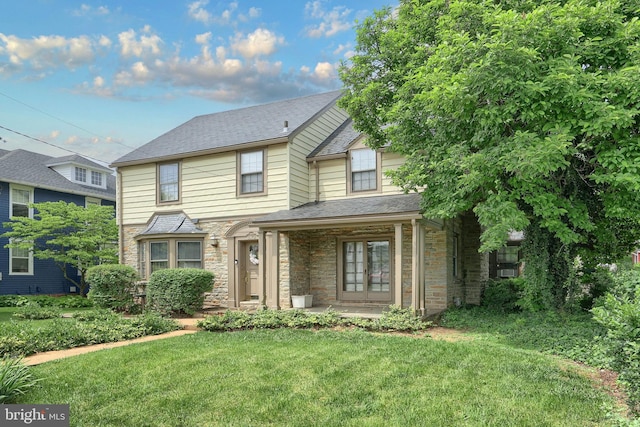 3172 N George St, Emigsville, PA 17318 - traditional-style home featuring stone siding, a front lawn, and roof with shingles