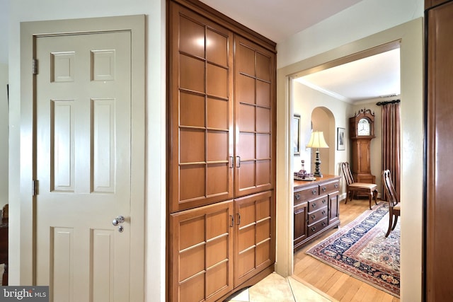 3172 N George St, Emigsville, PA 17318 - corridor with crown molding, light wood finished floors, and arched walkways