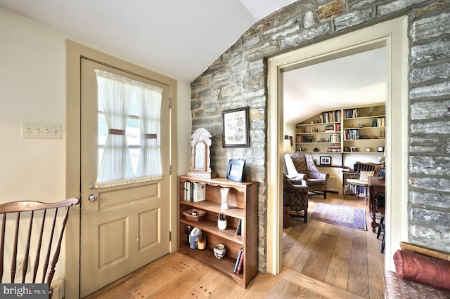 3172 N George St, Emigsville, PA 17318 - entryway with vaulted ceiling, light wood-style floors, and built in shelves