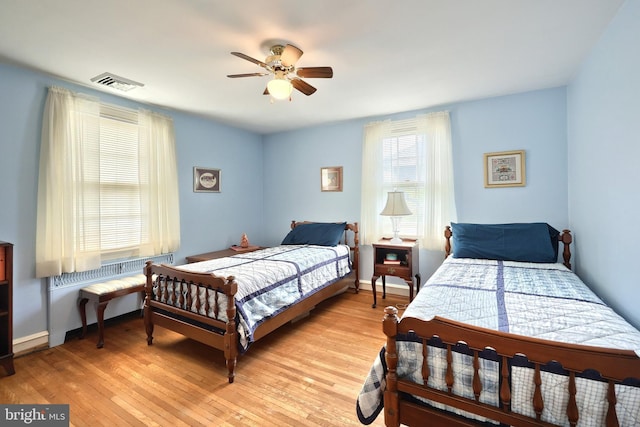 3172 N George St, Emigsville, PA 17318 - bedroom with light wood finished floors, ceiling fan, and baseboards