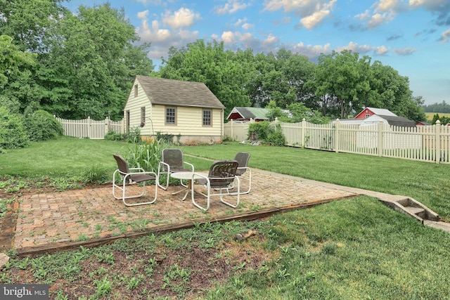 3172 N George St, Emigsville, PA 17318 - view of yard featuring a patio and an outbuilding