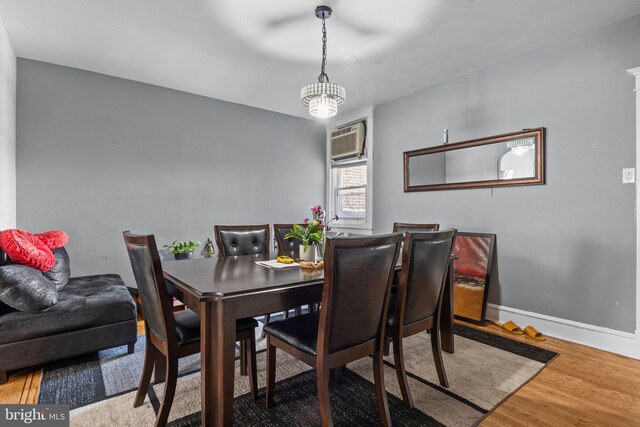 3537 Chippendale Ave, Philadelphia, PA 19136 - dining space with wood finished floors and a wall unit AC