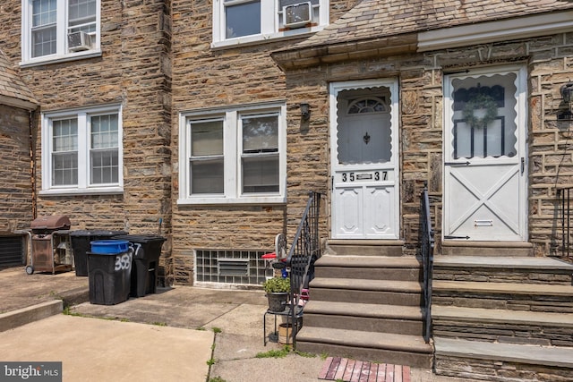 3537 Chippendale Ave, Philadelphia, PA 19136 - doorway to property featuring stone siding and cooling unit