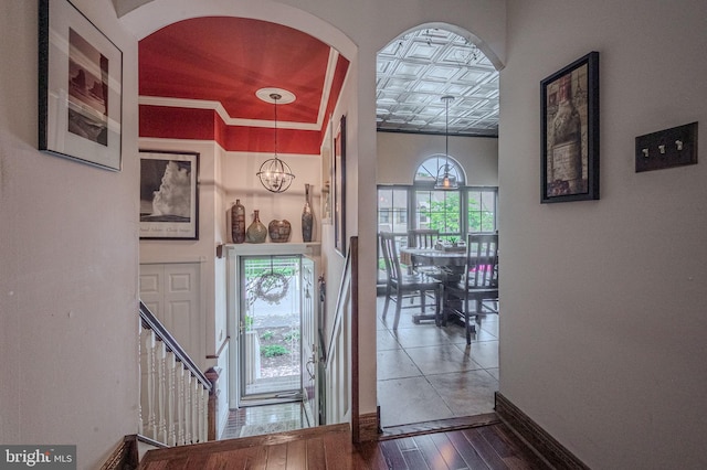 3305 Keswick Way Unit 3305D, West Chester, PA 19382 - entryway with healthy amount of natural light, hardwood / wood-style flooring, a chandelier, and arched walkways